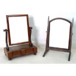 A late Georgian mahogany toilet mirror, with domed rectangular plate, 38 by 28 by 55.