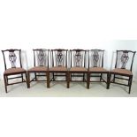 A set of six George III mahogany dining chairs, circa 1780, shaped top rails, pierced vase splats,