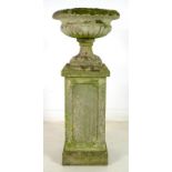 A reconstituted stone garden urn, with lobed body, on square section pedestal base, in five parts,