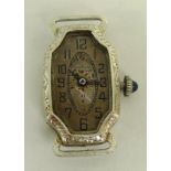 An 18K white gold Vanburen lady's wristwatch,