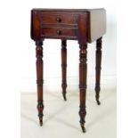 A small Regency mahogany Pembroke table, two small drop leaves,