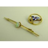 A 15ct gold brooch, the circular border inset with an enamel sailing boat,