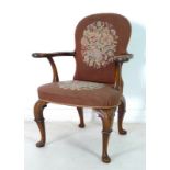 A George I style mahogany open armchair, early to mid 20th century, with spoonback,