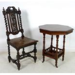 A 19th century Jacobean style oak chair, carved with barley twist and trailing vines,