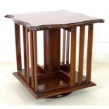 An Edwardian mahogany table top revolving open bookcase, 35.5 by 35.5 by 36cm high.