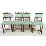 A set of four late Victorian mahogany dining chairs, with carved Italian style frames,