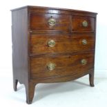 A Regency mahogany bow fronted chest of two short over two long drawers,