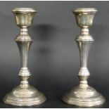 A pair of mid 20th century silver candlesticks, tapering ribbed form, Birmingham 1963,