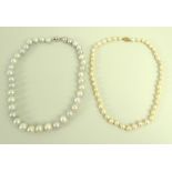 A single strand of forty eight bell and pear shaped pearls set with a 14ct gold clasp stamped with