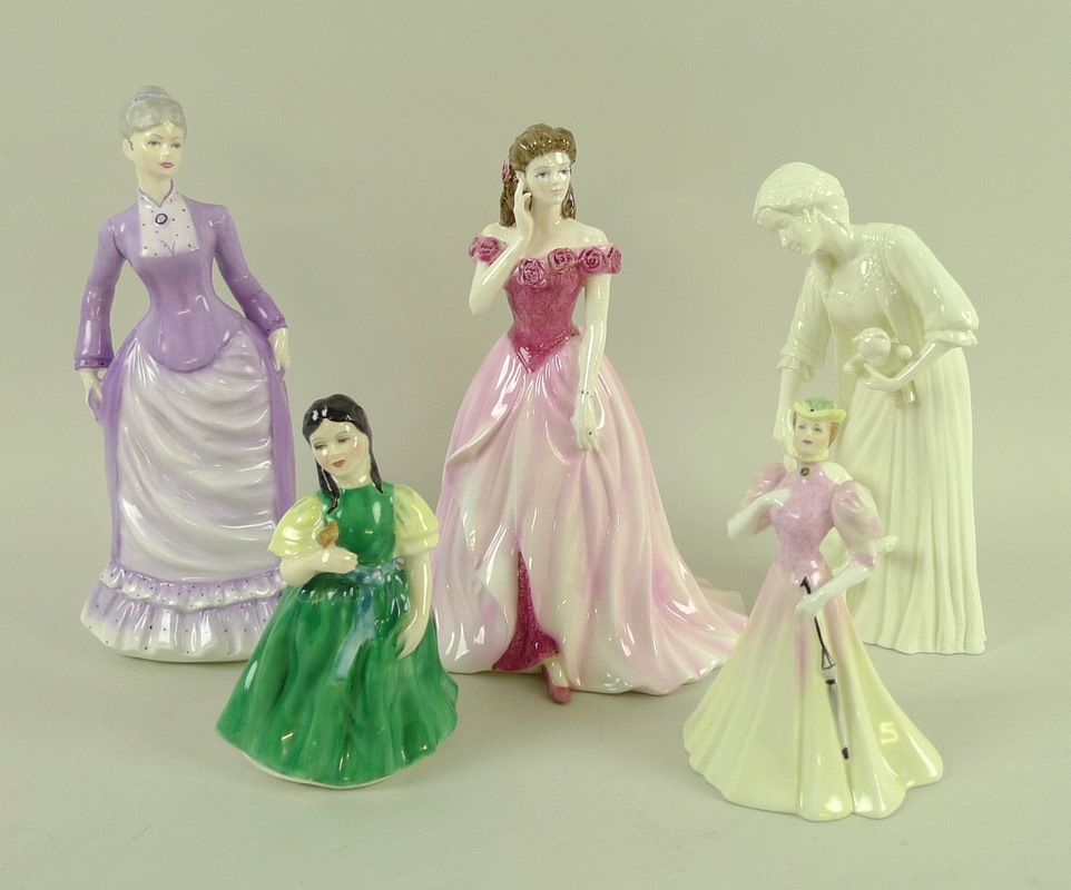 A group of five porcelain figurines,