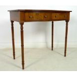 A 19th century mahogany bow fronted side table, two frieze drawers with brass knobs, cock beading,