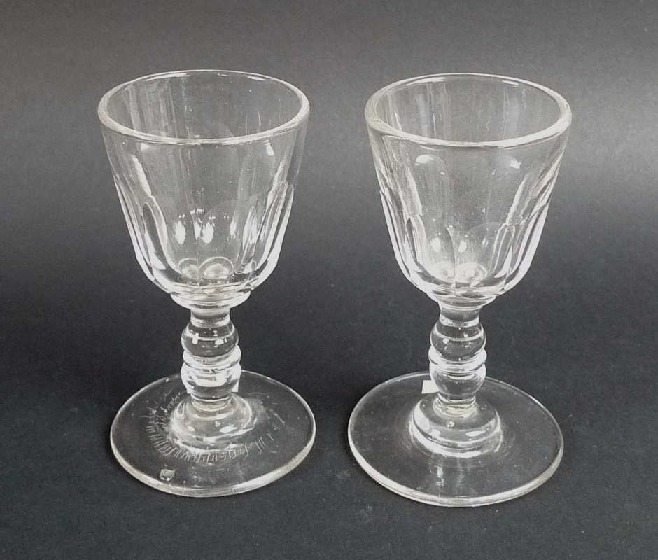 A pair of Georgian dram glasses, circa 1830,