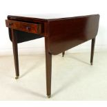A Regency mahogany and inlaid Pembroke table, single drawer with turned handles,