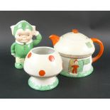 A Mabel Lucie Atwell tea set for Shelley, Rd No: 724421, comprising pixie house tea pot, pixie jug,