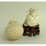 An ivory bottle carved in the form of a lychee, 19th century, with leaf finial to the lid, 4.