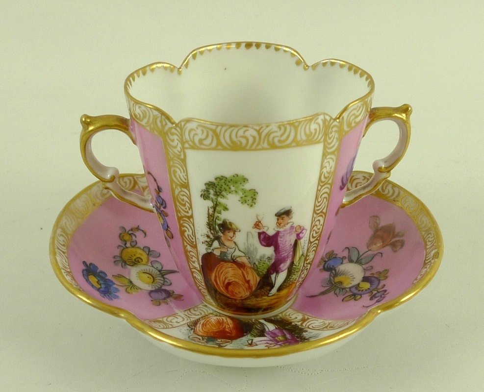 A Dresden porcelain twin handled porcelain tea cup and saucer, 19th century, - Image 2 of 3