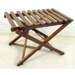 A mid to late 20th century slatted and folding luggage rack, 59.5 by 42 by 42.5cm.