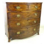 A Regency mahogany bow fronted chest of two short over three long drawers,