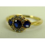 An 18ct gold, diamond and sapphire ring,