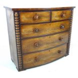 A Victorian mahogany bow fronted chest of two short over three long graduating drawers,