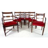 A set of five, plus one similar, Regency mahogany bar back dining chairs, including one carver,