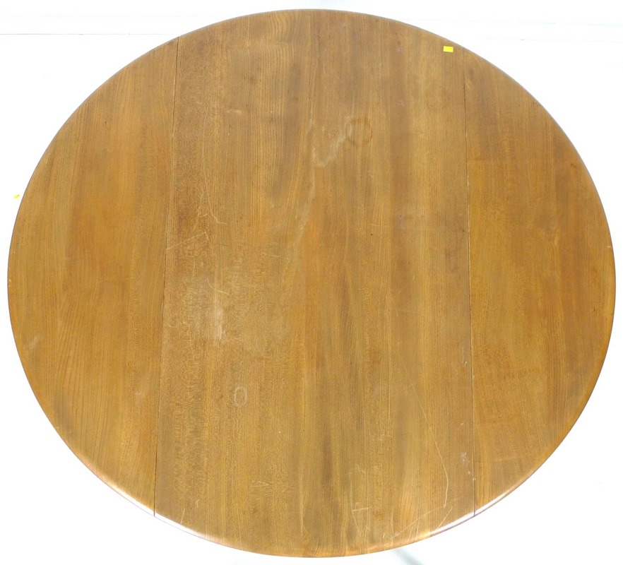 An Ercol dining suite, circa 1960's, comprising circular elm and beech drop leaf dining table, - Image 4 of 10