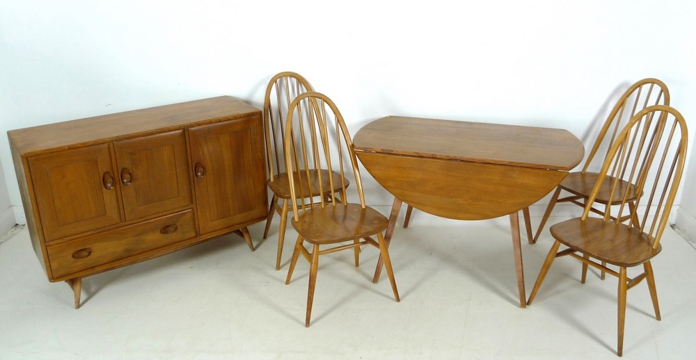 An Ercol dining suite, circa 1960's, comprising circular elm and beech drop leaf dining table, - Image 2 of 10