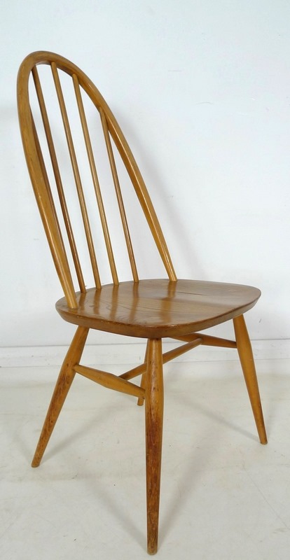 An Ercol dining suite, circa 1960's, comprising circular elm and beech drop leaf dining table, - Image 6 of 10