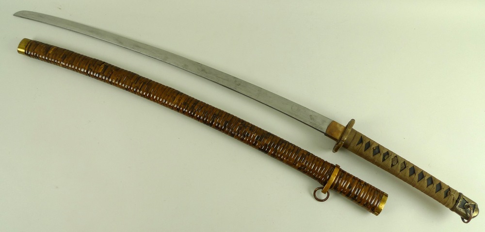 A 19th century Japanese katana blade, 73cm, the tang signed Koka, with shagreen tsuka,