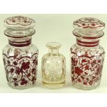 A pair of Continental glass faceted jars and covers, late 19th century,