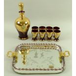 A collection of ruby and gold Murano glass ware, comprising a tray with an etching of two figures,