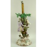 A large 19th century Meissen centre piece later converted to a lamp,