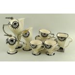 A Moorland Art Deco style part tea set with black and silver sun decoration to sinuous bodies,