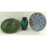 A collection of 19th century Turkish hand painted earthenware, comprising a green glazed dish,