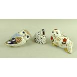 A group of three Royal Crown Derby paperweight animals, comprising the Harbour Seal,