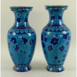 A pair of Iznik earthenware baluster vases,