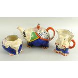 A Royal Venton ware teaset comprising a teapot, milk jug and sucrier, all modelled as elephants,