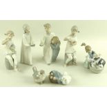 A collection of Lladro figures, comprising Bashful Bather Girl washing Dog, model no.