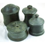 PEWTER TOBACCO JARS. All circular shape, one with reclining figure finial with damper, tallest 5.