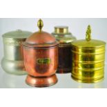 GROUP OF TOBACCO JARS. Copper cylindrical jar with brass acorn finial, plus one with TOBACCO to