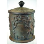 1800 DATED HEAVY CAST IRON TOBACCO JAR. 7.75ins tall to top of cover, cylindrical form with standing