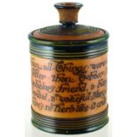 DOULTON TOBACCO JAR. 6.25ins tall, cylindrical jar with Charles Kingsley motto all around, brown &