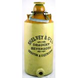 EASTBOURNE LARGE BULK GINGER BEER BOTTLE. 20ins tall to top of stopper, twin handles to shoulder.