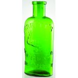 BARRETTS MANDRAKE EMBROCATION BOTTLE. 4.5ins tall, emerald green glass, rectangular shape with round