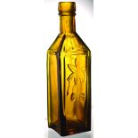 DR SOULES SPLIT SIZE BOTTLE. 8ins tall, golden amber, tall square base shape with 4 facetted side