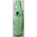 GATESHEAD VALLETS PATENT CODD BOTTLE. 8.75ins tall, aqua glass bulb neck with wooden stopper.