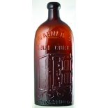 WARNERS SAFE CURE BOTTLE. 9.25ins tall, deep red/ amber glass. Embossed WARNERS SAFE CURE/ PRESSBURG