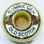 BONNIE GEM OLD SCOTCH MATCHSTRIKER. 4.25ins diam, donut shaped striker, BONNIE GEM/ OLD SCOTCH brown