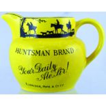 HUNTSMAN BRAND PUB JUG. 4.5ins tall, external yellow glazed, handled jug for HUNTSMA BRAND/ YOUR