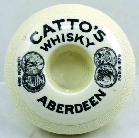 ABERDEEN CATTOS WHISKY MATCH STRIKER. 4.25ins diam, donut shape striker/ holder, off white glaze